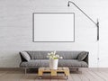 Mock up frame poster in scandinavian style livingroom with fabric sofa, lamp and plant in bucket on white wall background. Royalty Free Stock Photo