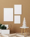 Mock up frames with Christmas decor near plywood wall, Christmas interior background