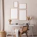 Mock up gallery wall in Scandinavian interior background, rattan chair and white desk in home office room design