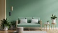 Mock up green wall with green sofa and decor in living room Royalty Free Stock Photo