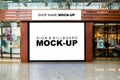 Mock up shop name and large billboard at airport terminal Royalty Free Stock Photo