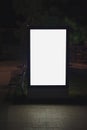 Mock up of Illuminated blank billboard in night city. Royalty Free Stock Photo