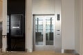 Mock up LED Screen near elevator metallic cabin glass door Royalty Free Stock Photo