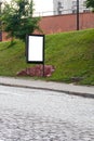 Mock up of light box on the street of metropolitan city for your advertising. Blank billboard with copy space Royalty Free Stock Photo