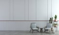 Two armchairs in room with white wall background. Scandinavian style interior design of modern living room. Royalty Free Stock Photo