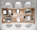 Mock up meeting conference table with office accessories and laptop computers, hipster interior background, Royalty Free Stock Photo