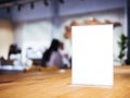 Mock up Menu frame on Table Restaurant cafe Interior background Royalty Free Stock Photo