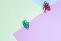Mock up minimal background in pastel color with red and green paper clip Royalty Free Stock Photo