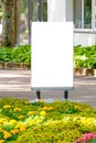 Mock up. Outdoor advertising, blank billboard outdoors, public information board in the park Royalty Free Stock Photo