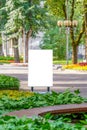 Mock up. Outdoor advertising, blank billboard outdoors, public information board in the park Royalty Free Stock Photo