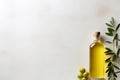 Mock up with plump green olives and bottle of premium olive oil Royalty Free Stock Photo