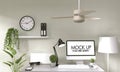 Mock up poster computer in office zen style and decoration on top table office.3D rendering Royalty Free Stock Photo