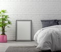 Mock up poster frame in bedroom interior background with brick wall, 3D illustration Royalty Free Stock Photo