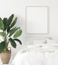 Mock-up poster frame in bedroom, Scandinavian style Royalty Free Stock Photo