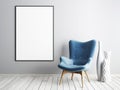 Mock up poster frame with blue armchair and metal table in simple living room interior.