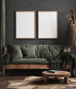 Mock up poster frame in dark green living room interior, ethnic style Royalty Free Stock Photo