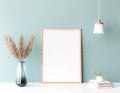 Mock up poster frame in modern interior green background, Scandinavian style