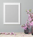 mock up poster frame in modern interior with pink flowers and gray background, living room, Scandinavian style, 3D render Royalty Free Stock Photo