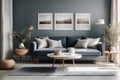 Mock up poster frame in modern sunny interior background, living room with cozy navy blue sofa Royalty Free Stock Photo