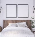 Mock-up poster frame in rustic bedroom interior background Royalty Free Stock Photo