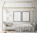 Mock up poster frames in children bedroom, scandinavian style interior background, 3D render Royalty Free Stock Photo