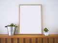 Mock up Poster Wooden Frame with Plants Home decoration