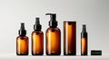 Mock up Realistic Glossy Amber Transparent Glass Cosmetic Soap, Shampoo, Cream, Oil Dropper and Spray Bottles Set With Black Cap Royalty Free Stock Photo