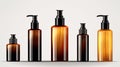 Mock up Realistic Glossy Amber Transparent Glass Cosmetic Soap, Shampoo, Cream, Oil Dropper and Spray Bottles Set With Black Cap Royalty Free Stock Photo