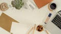 Mock up scene creator with stationery, supplies, laptop, coffee cup, decorations and copy space on white table Royalty Free Stock Photo