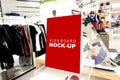 Mock up sign board in fashion clothes shop Royalty Free Stock Photo