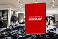 Mock up signboard advertising standing in fashion jeans shop