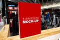 Mock up signboard in fashion clothes shop in shopping mall Royalty Free Stock Photo