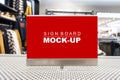 Mock up signboard on showcased in clothing shop Royalty Free Stock Photo