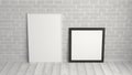 Mock up of square and vertical black and white frames on the floor with white brick wall Royalty Free Stock Photo
