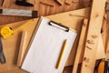 Mock up template clipboard note paper in woodwork carpentry workshop Royalty Free Stock Photo