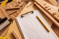 Mock up template clipboard note paper in woodwork carpentry workshop