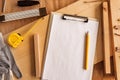 Mock up template clipboard note paper in woodwork carpentry workshop