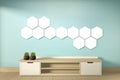 Mock up Tv shelf and hexagon lamp on wall mint room modern tropical style - empty room interior - minimal design. 3d rendering