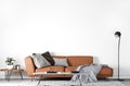 Mock Up Wall In Modern Interior Background, Living Room, with orange leather sofa . Grey plaid and cushions . Wooden table Royalty Free Stock Photo