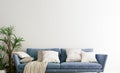 Mock up wall with steel blue sofa in modern interior background, living room, Scandinavian style, wide close-up