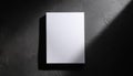 Mock-up of white blank card sheet of paper on black textured surface. Postcard template. Top view Royalty Free Stock Photo