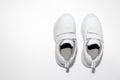 mock up white girl sneakers with velcro fasteners with hard light isolated on white background