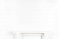 Mock-up of a white wall with a mantelpiece for your design Royalty Free Stock Photo