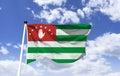 Mockup of Abkhazia Flag fluttering under blue sky