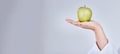 Mockup apple, hand and banner for diet marketing, health promotion or advertising nutrition. Space, wellness and person