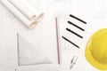 Mockup of architectural concept, Drawing tools and engineer drawing on blueprint with safety helmet Royalty Free Stock Photo