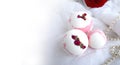 Mockup bath bombs, towel, pearl and red rose on white background. Royalty Free Stock Photo