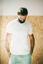 Mockup of a bearded man wearing white tshirt and