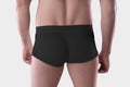 Mockup of black male boxers on the athletic body of a guy, brief underwear, isolated on background Royalty Free Stock Photo