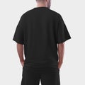 Mockup of an black oversized men`s t-shirt for design, print, pattern Royalty Free Stock Photo